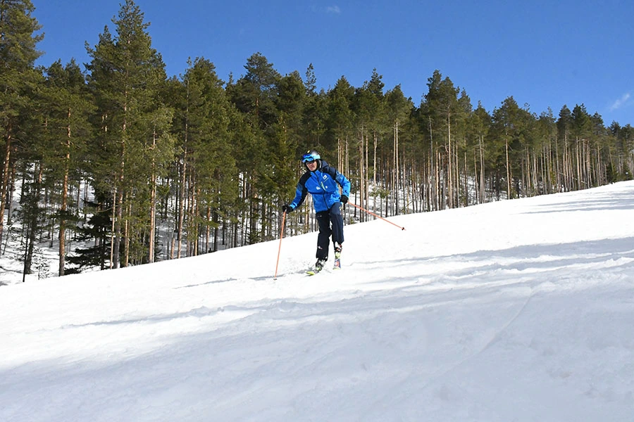 Ski teacher with kids