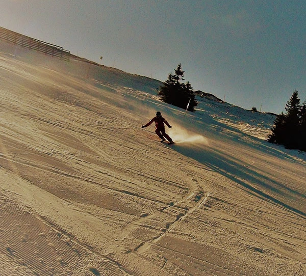 Ski man sliding on snow